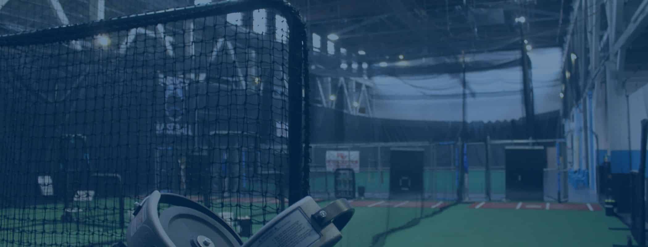 Indoor batting lane used for private baseball lessons at Energy Athletics